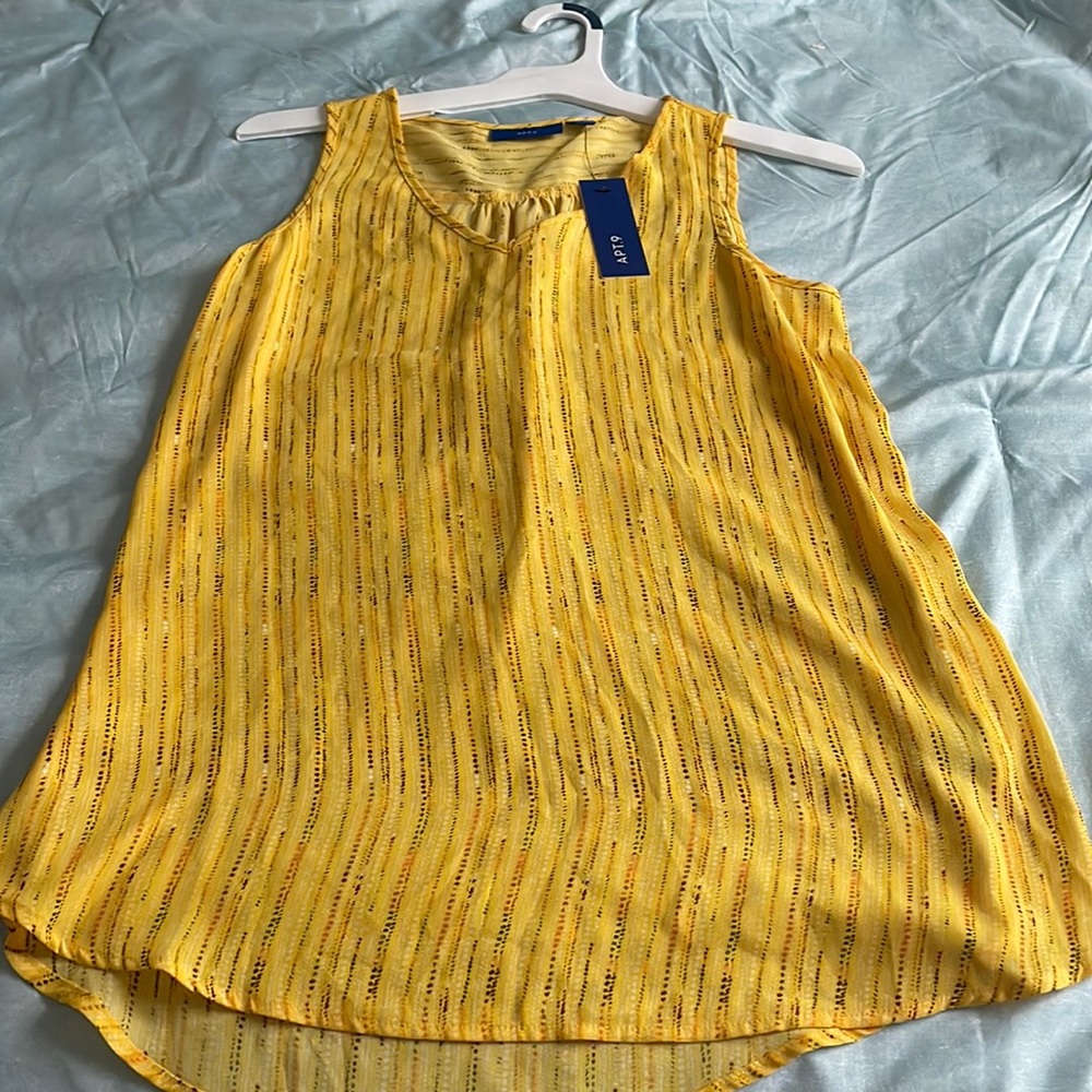 Sleeveless yellow blouse